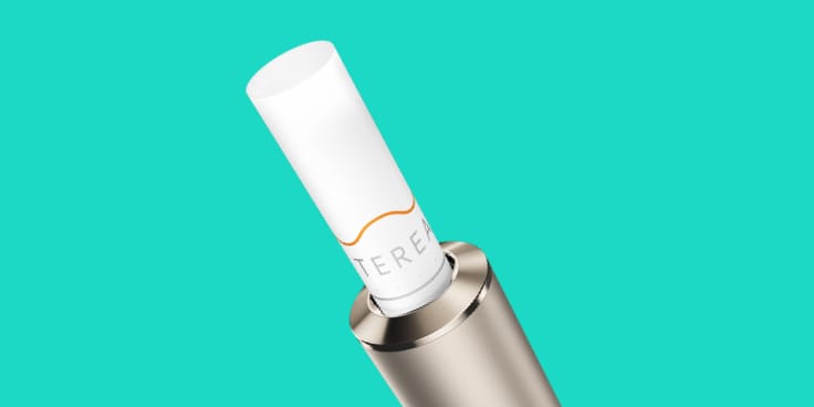 An IQOS ILUMA Holder with a TEREA tobacco stick inserted.